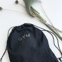 Dansebutikken Gymnastikpose sort med guldtryk - GYM